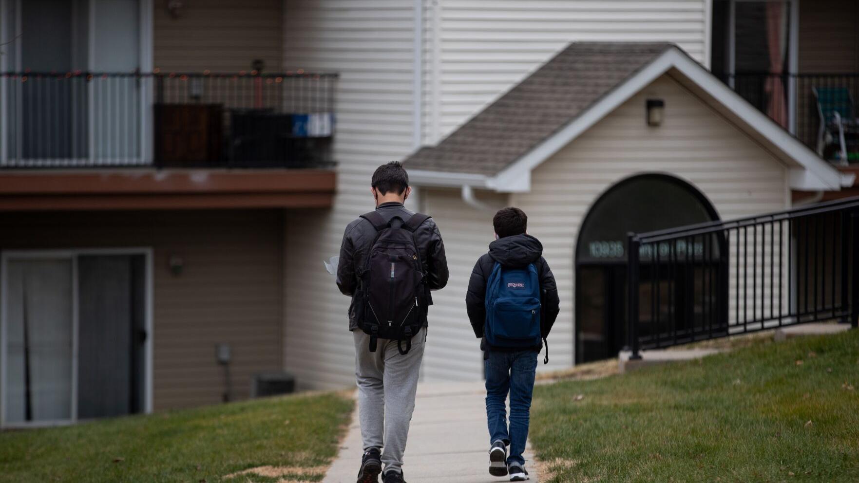 Cousins adjust to OPS middle school but miss their parents in Afghanistan